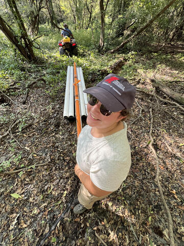 Maneuvering an EM device through the woods.