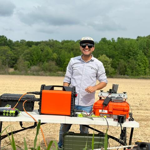 Working with geophysical equipment.
