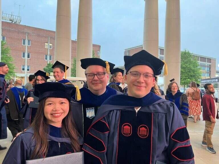 Photo of Drs. Nguyen, Wellman, and Beam at 2024 Graduation